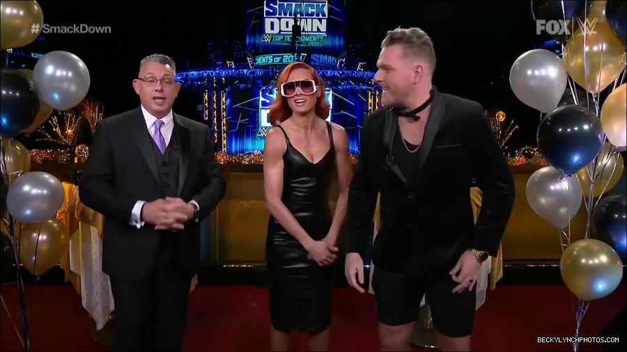 WWE_Friday_Night_SmackDown_2021_12_31_WWE_s_Top_Ten_Moments_Of_2021_720p_HDTV_x264-NWCHD_mp4_000246045.jpg