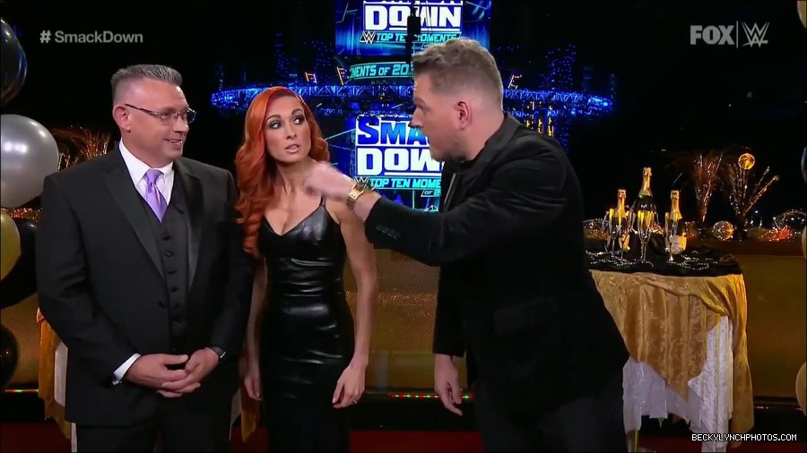 WWE_Friday_Night_SmackDown_2021_12_31_WWE_s_Top_Ten_Moments_Of_2021_720p_HDTV_x264-NWCHD_mp4_004310244.jpg