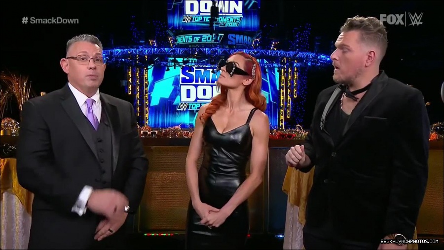 WWE_Friday_Night_SmackDown_2021_12_31_WWE_s_Top_Ten_Moments_Of_2021_720p_HDTV_x264-NWCHD_mp4_004690825.jpg