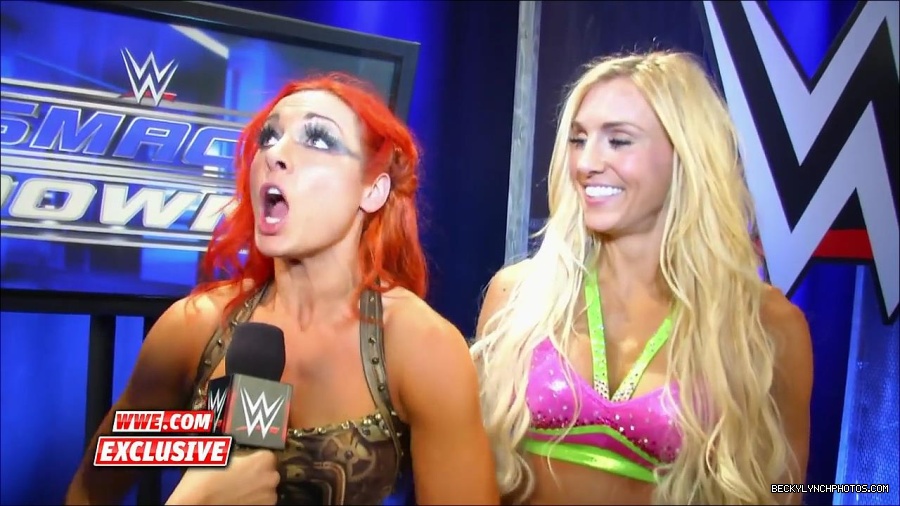 Y2Mate_is_-_Becky_Lynch_and_Charlotte_roll_on_SmackDown_Fallout2C_Aug__272C_2015-bwjoUMDBNrg-720p-1655734799789_mp4_000061127.jpg