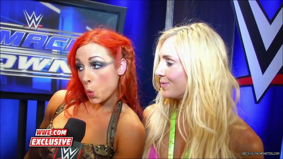 Y2Mate_is_-_Becky_Lynch_and_Charlotte_roll_on_SmackDown_Fallout2C_Aug__272C_2015-bwjoUMDBNrg-720p-1655734799789_mp4_000070737.jpg