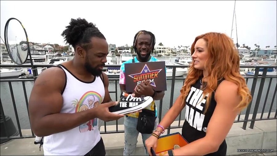Y2Mate_is_-_Becky_Lynch_and_Kofi_Kingston_s_CUSTOM_CONVERSE_KICKS_at_Comic-Con_201921_I_Just_Love_Kicks__31-DzCWzxnMtU0-720p-1656083286802_mp4_000135200.jpg