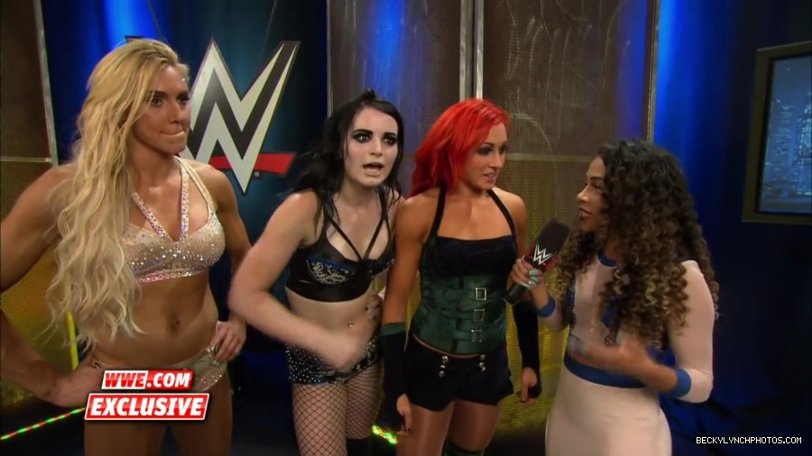 PCB_celebrate_their_big_win_at_Summerslam__WWE_com_Exclusive2C_August_232C_2015_mp41949.jpg
