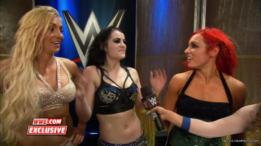 PCB_celebrate_their_big_win_at_Summerslam__WWE_com_Exclusive2C_August_232C_2015_mp41953.jpg