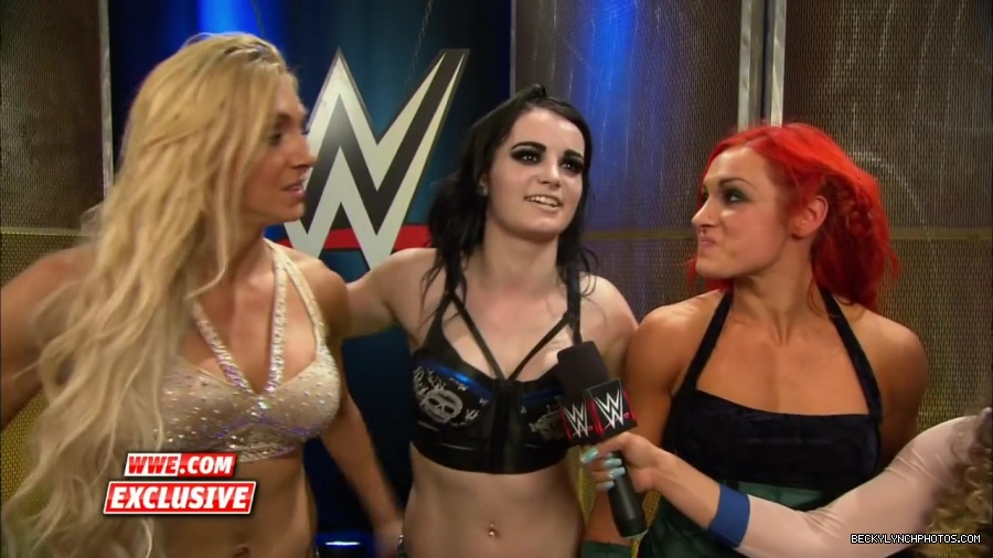 PCB_celebrate_their_big_win_at_Summerslam__WWE_com_Exclusive2C_August_232C_2015_mp41955.jpg