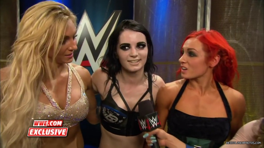 PCB_celebrate_their_big_win_at_Summerslam__WWE_com_Exclusive2C_August_232C_2015_mp41956.jpg