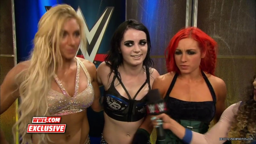 PCB_celebrate_their_big_win_at_Summerslam__WWE_com_Exclusive2C_August_232C_2015_mp41957.jpg