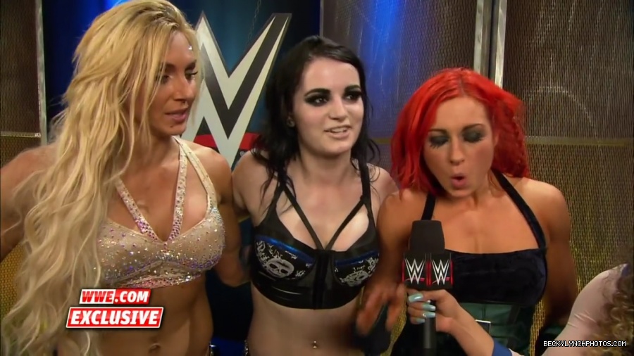 PCB_celebrate_their_big_win_at_Summerslam__WWE_com_Exclusive2C_August_232C_2015_mp41958.jpg