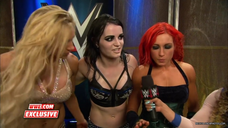 PCB_celebrate_their_big_win_at_Summerslam__WWE_com_Exclusive2C_August_232C_2015_mp41959.jpg
