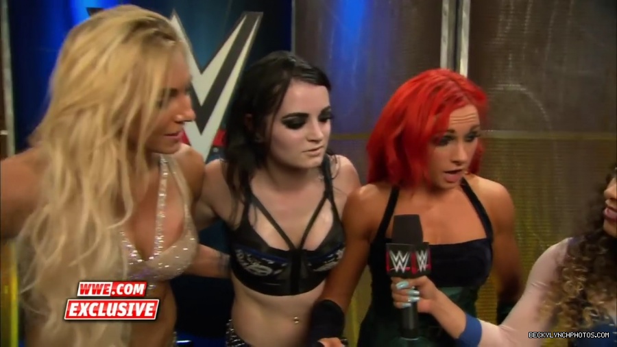 PCB_celebrate_their_big_win_at_Summerslam__WWE_com_Exclusive2C_August_232C_2015_mp41963.jpg