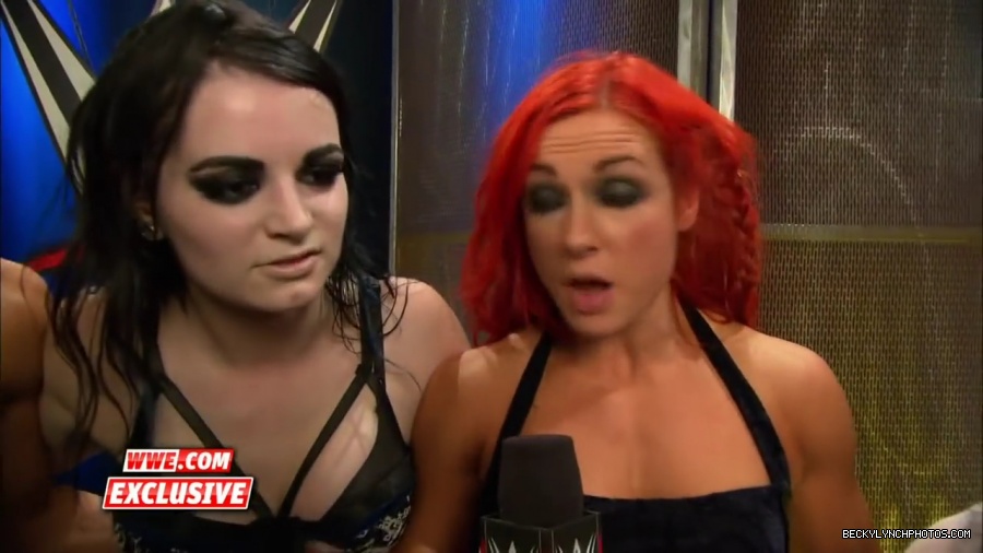 PCB_celebrate_their_big_win_at_Summerslam__WWE_com_Exclusive2C_August_232C_2015_mp41964.jpg