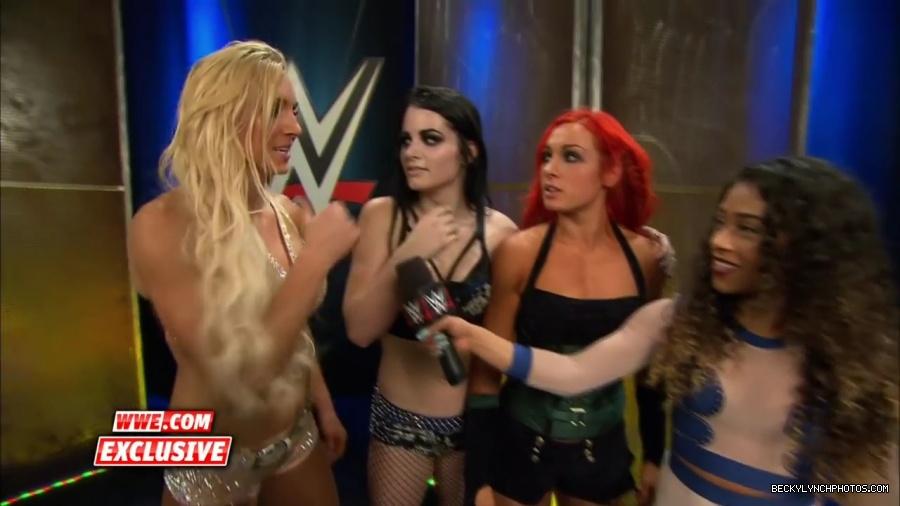 PCB_celebrate_their_big_win_at_Summerslam__WWE_com_Exclusive2C_August_232C_2015_mp41971.jpg