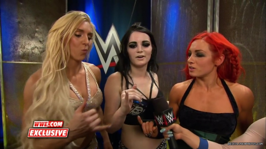 PCB_celebrate_their_big_win_at_Summerslam__WWE_com_Exclusive2C_August_232C_2015_mp41975.jpg