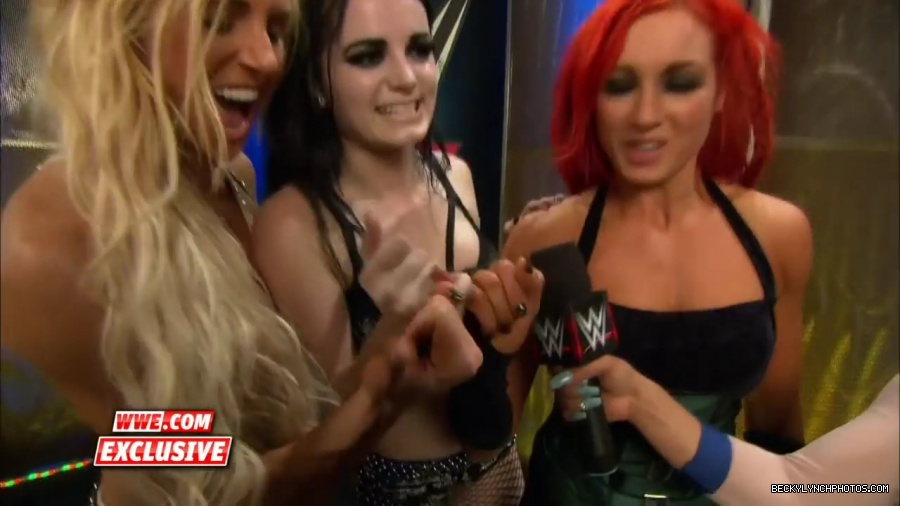 PCB_celebrate_their_big_win_at_Summerslam__WWE_com_Exclusive2C_August_232C_2015_mp41976.jpg