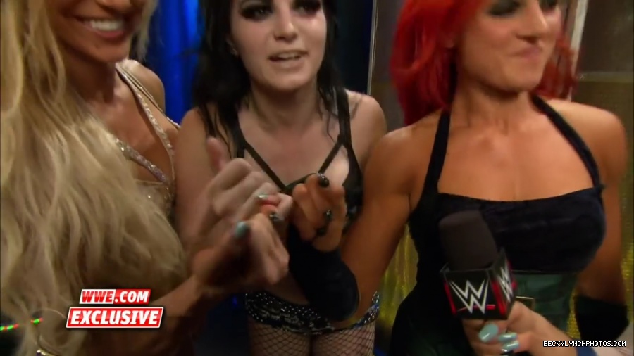 PCB_celebrate_their_big_win_at_Summerslam__WWE_com_Exclusive2C_August_232C_2015_mp41977.jpg
