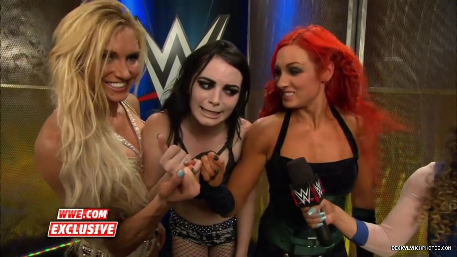 PCB_celebrate_their_big_win_at_Summerslam__WWE_com_Exclusive2C_August_232C_2015_mp41978.jpg